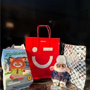 Disney Zootopia Bellwether Plush with Red Miniso Bag.